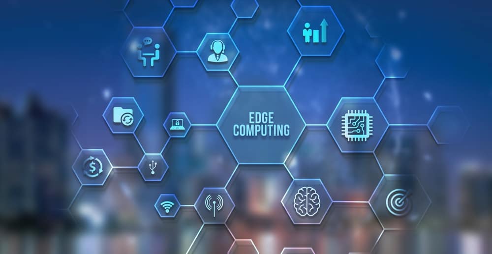Edge Computing is at the center of a network of hexagons containing icons of edge computing concepts.