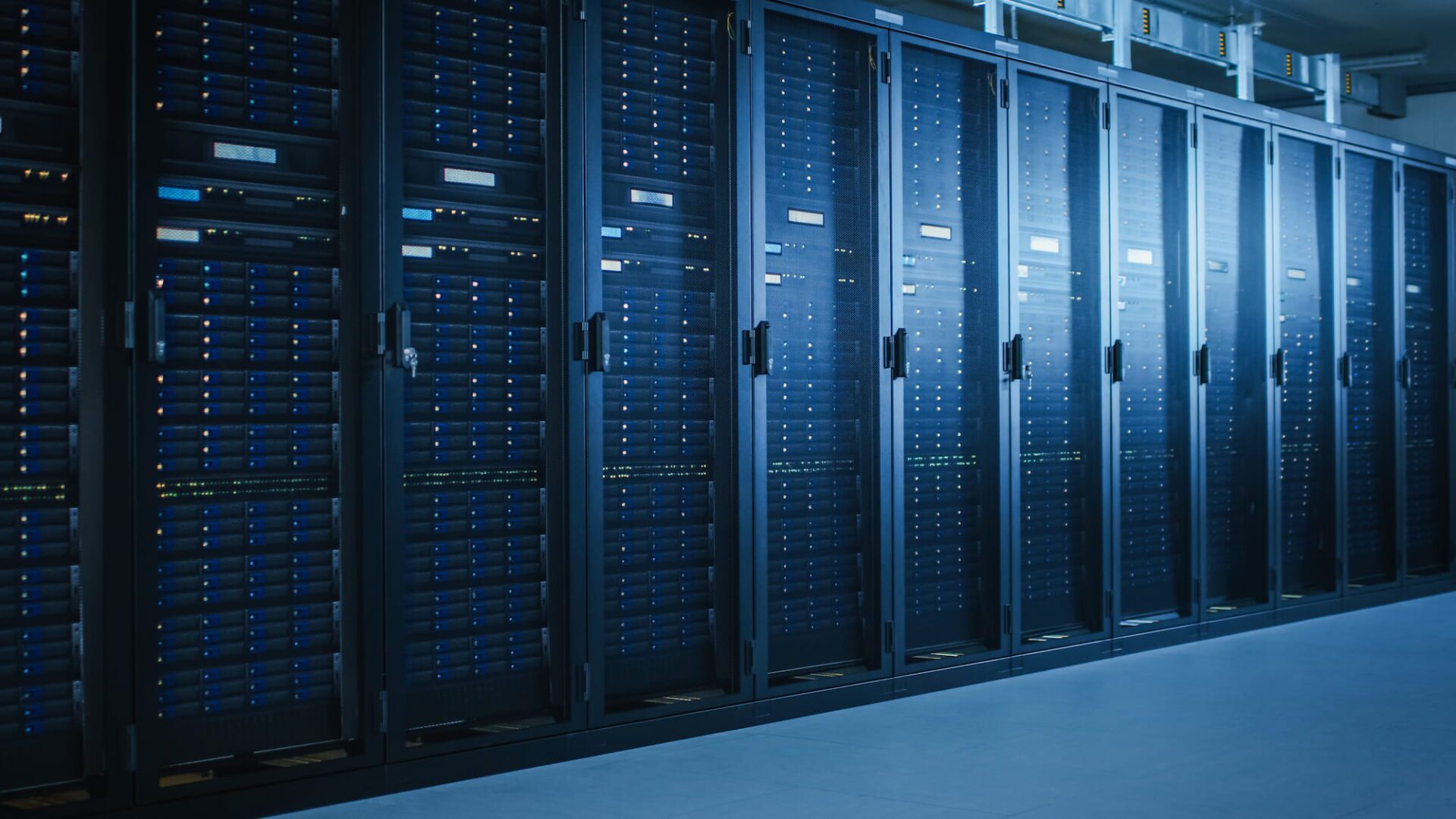 A row of data center cabinets with end-of-row or top-of-rack switches.